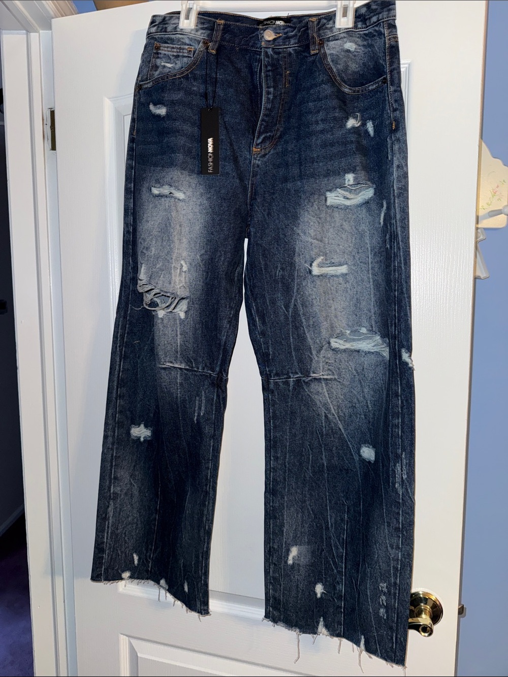 Fashion Nova Woman’s Distressed Dark Blue Relaxed Jeans